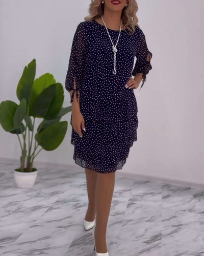 Deborah | Airy dress with polka dot print and pleated skirt