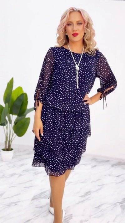Deborah | Airy dress with polka dot print and pleated skirt