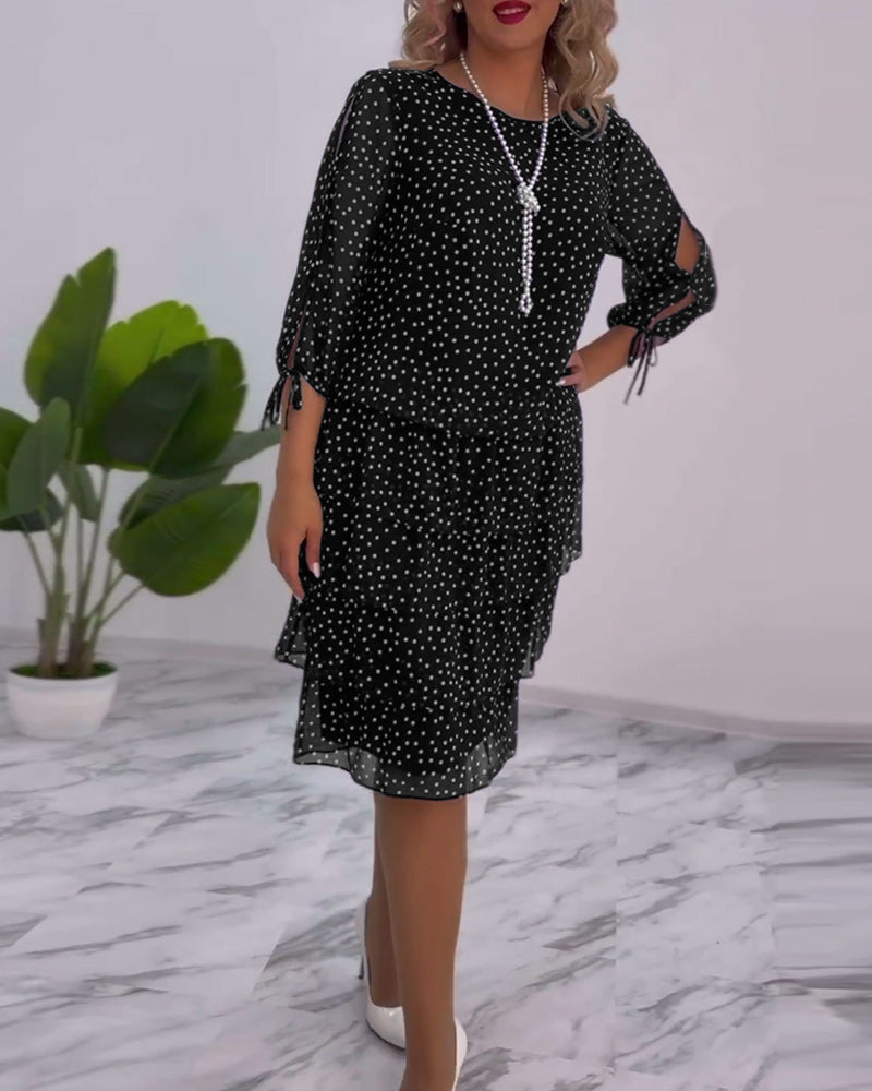 Deborah | Airy dress with polka dot print and pleated skirt