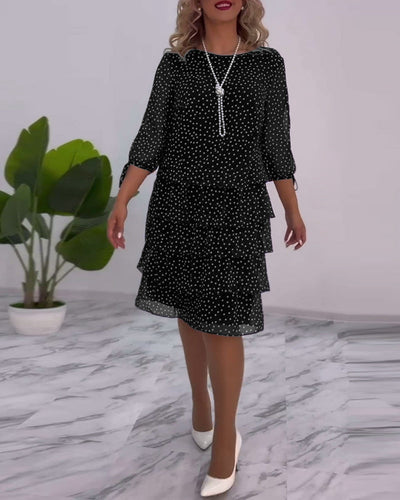 Deborah | Airy dress with polka dot print and pleated skirt