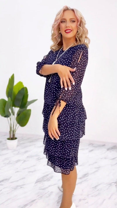 Deborah | Airy dress with polka dot print and pleated skirt